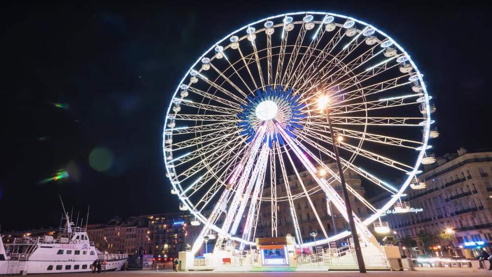 Ferris wheel on the coast of Marseille, where you can see the sights of the city