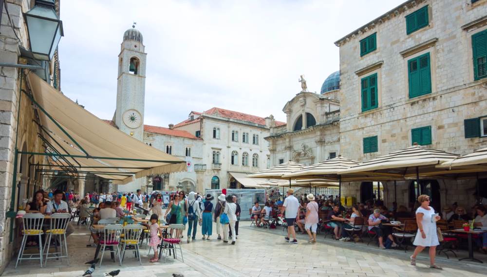 Thousands of tourists come to see Stradun Square
